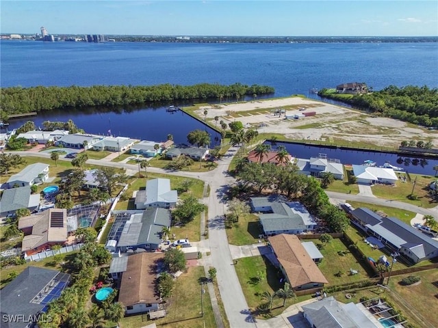 drone / aerial view with a water view