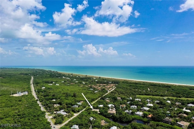 aerial view featuring a view of the beach and a water view