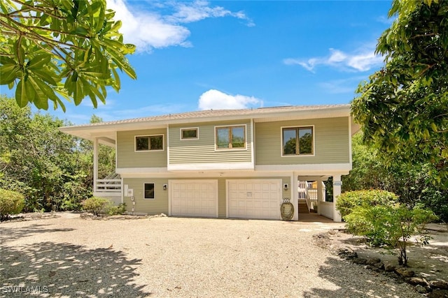 bi-level home featuring a garage