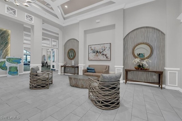 living room with light tile patterned floors, a high ceiling, and coffered ceiling