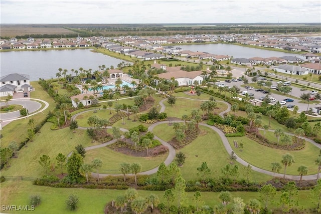 drone / aerial view with a water view