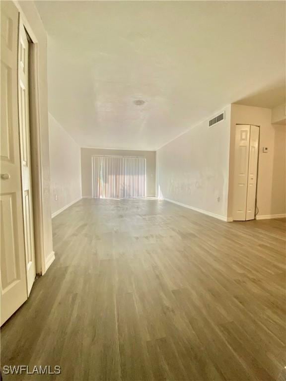 spare room featuring hardwood / wood-style floors