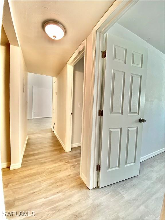 hallway featuring light hardwood / wood-style floors