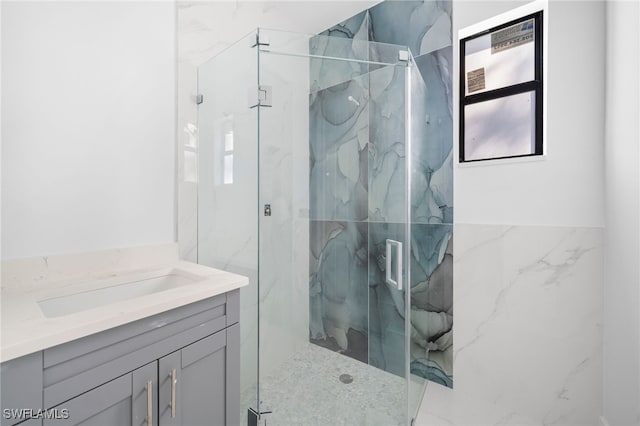 bathroom featuring vanity and walk in shower