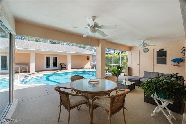 view of swimming pool featuring ceiling fan