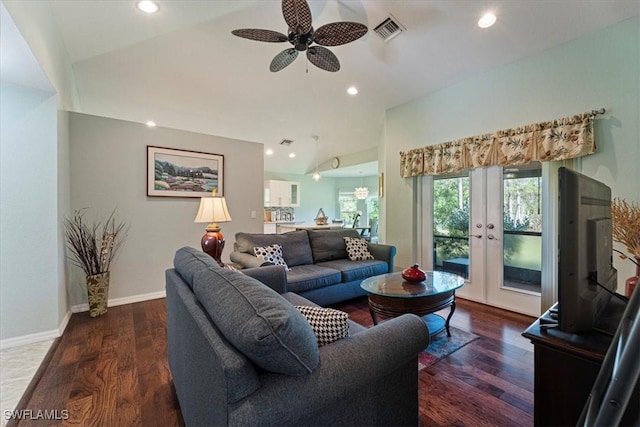 living room featuring ceiling fan, lofted ceiling, dark wood-type flooring, and french doors