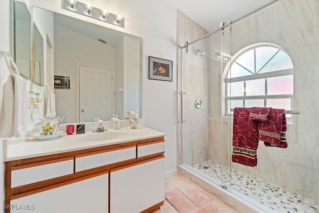 bathroom featuring vaulted ceiling, tile patterned flooring, vanity, and an enclosed shower