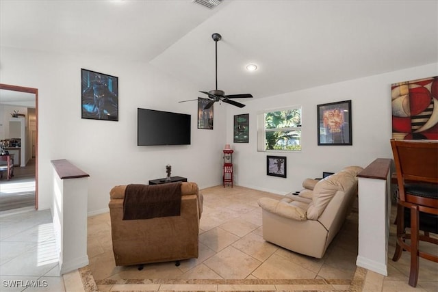 tiled living room with ceiling fan and lofted ceiling