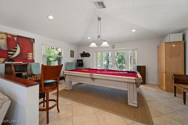 recreation room with french doors, light tile patterned flooring, a healthy amount of sunlight, and billiards