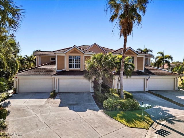 view of front of property with a garage