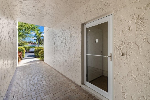 788 Park Shore Dr Unit B17, Naples, FL 34103 - property entrance featuring stucco siding