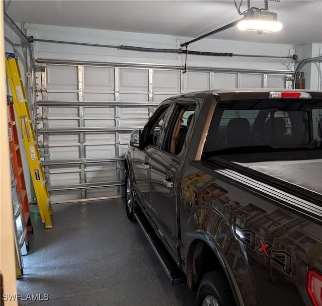 garage featuring a garage door opener