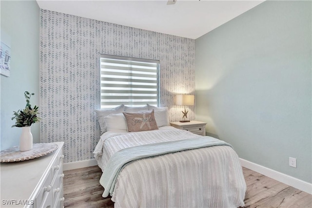 bedroom featuring light hardwood / wood-style flooring