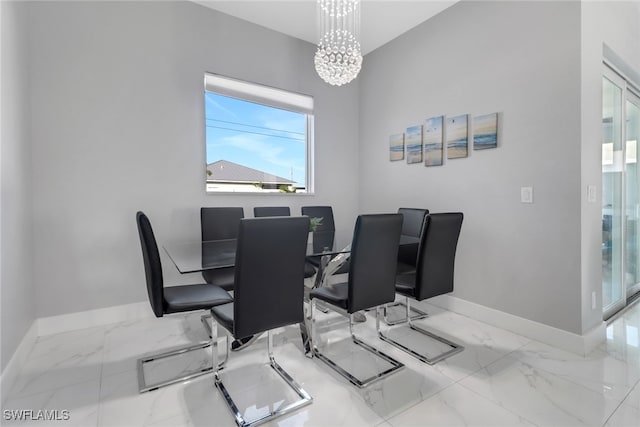 dining area with a chandelier