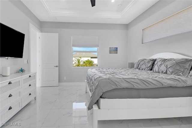 bedroom with ceiling fan, a raised ceiling, and crown molding