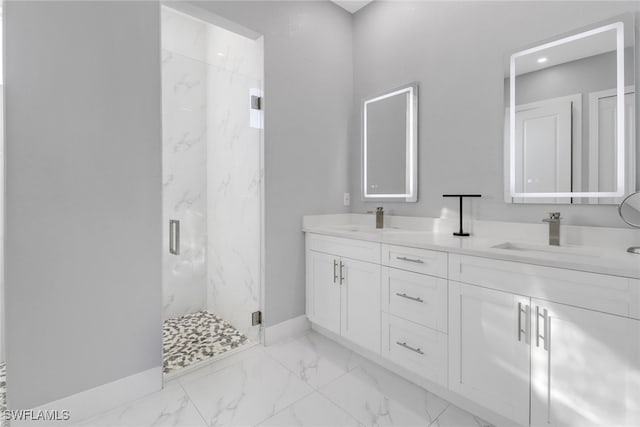 bathroom featuring vanity and a shower with shower door