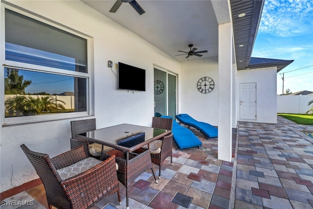 view of patio with ceiling fan