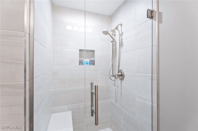bathroom featuring a shower stall