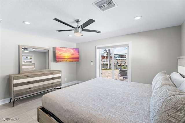 tiled bedroom featuring access to outside and ceiling fan