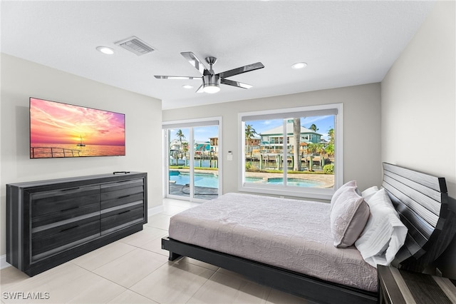 bedroom with recessed lighting, light tile patterned floors, visible vents, access to exterior, and ceiling fan