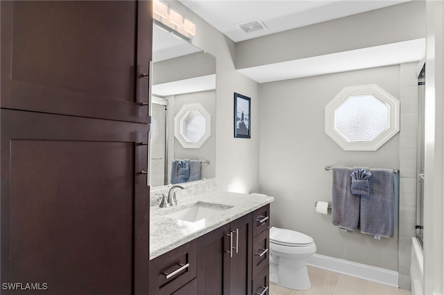 full bathroom featuring vanity, visible vents, baseboards, and toilet