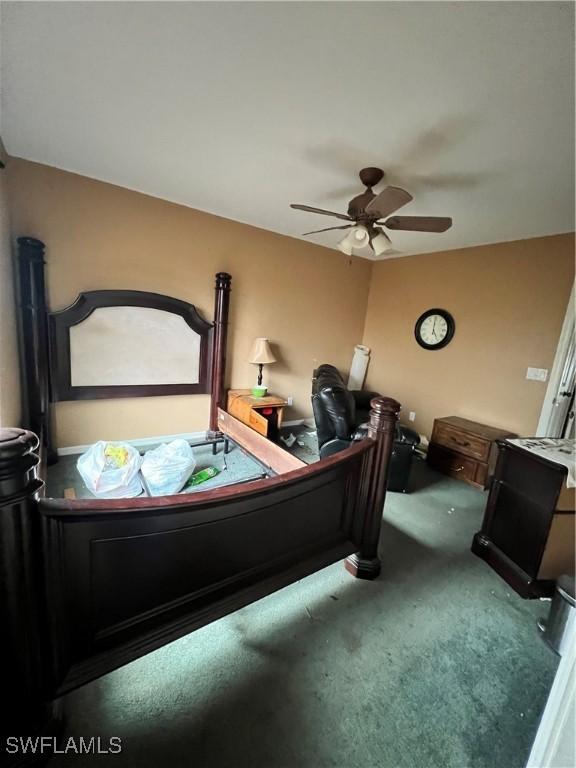 carpeted bedroom with ceiling fan