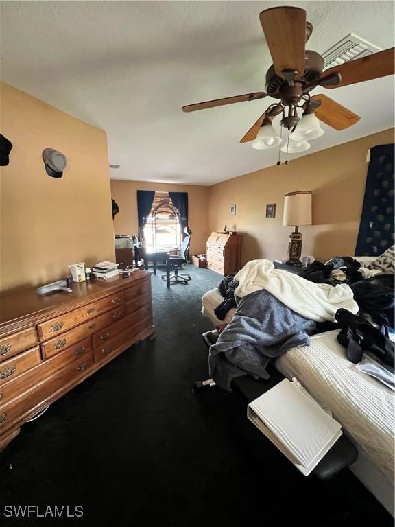 bedroom with carpet floors and ceiling fan