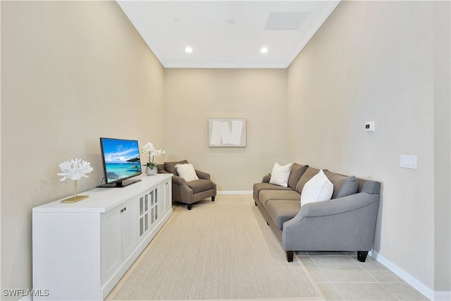 tiled living room with ornamental molding