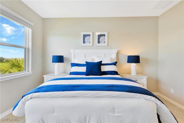 bedroom featuring tile patterned floors