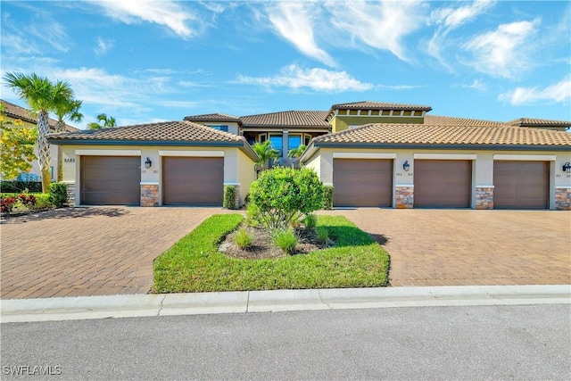 view of front of property with a garage