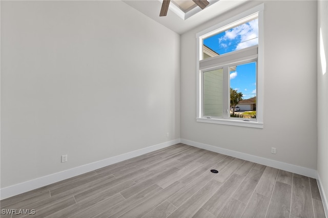 empty room with light hardwood / wood-style floors