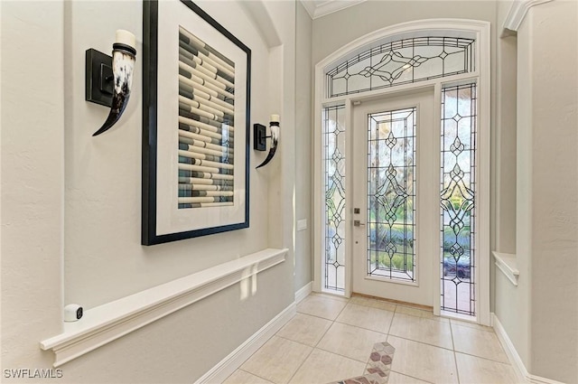 entrance foyer featuring light tile patterned floors