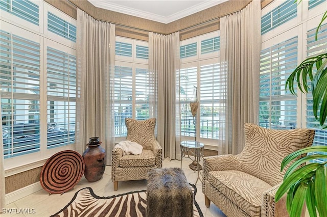 living area with ornamental molding