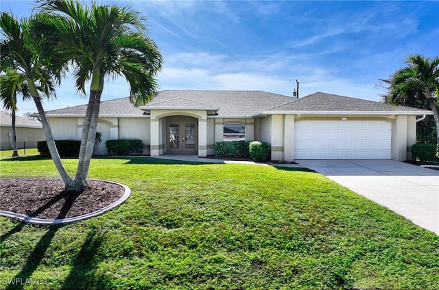 ranch-style house with french doors, a front lawn, and a garage