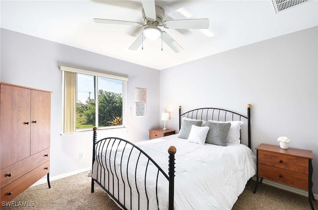 bedroom with ceiling fan, a closet, and carpet floors