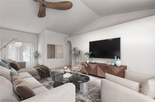 living room featuring ceiling fan, hardwood / wood-style floors, and lofted ceiling