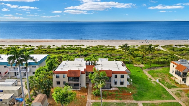 bird's eye view with a beach view and a water view