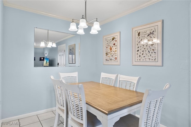 tiled dining room featuring an inviting chandelier and ornamental molding