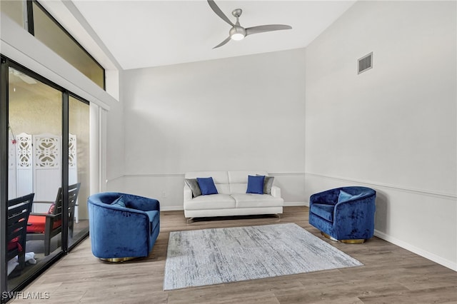 sitting room featuring hardwood / wood-style flooring and ceiling fan