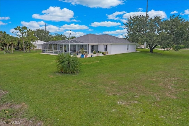 view of yard with a lanai