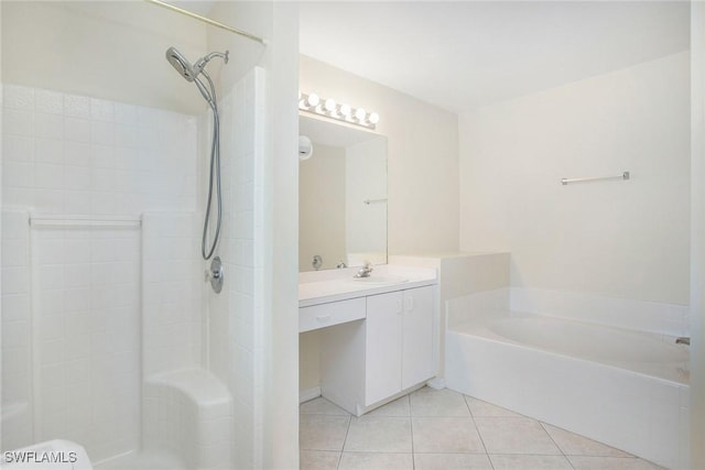 bathroom featuring tile patterned floors, plus walk in shower, and vanity