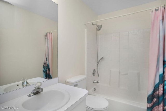 full bathroom featuring toilet, vanity, and shower / tub combo with curtain