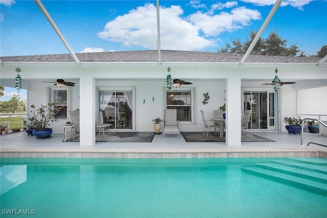 exterior space with a lanai, a patio area, and ceiling fan