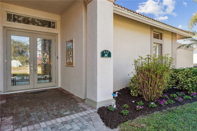 doorway to property featuring french doors