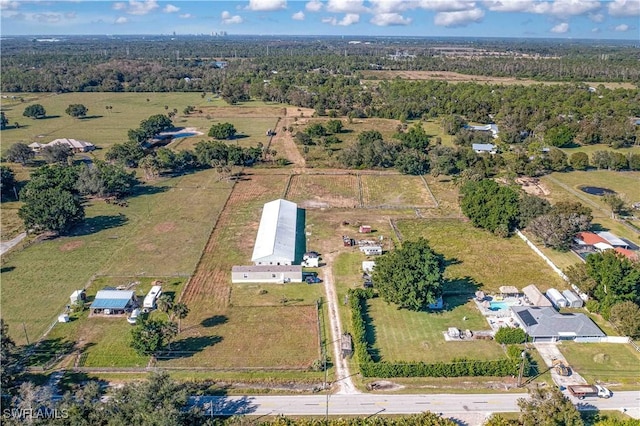 birds eye view of property featuring a rural view