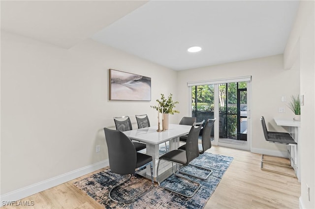 dining room featuring light wood-type flooring