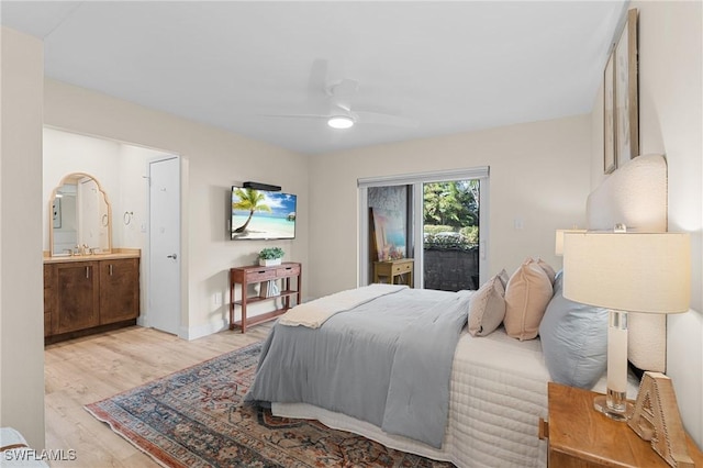 bedroom with sink, ensuite bath, ceiling fan, access to exterior, and light wood-type flooring