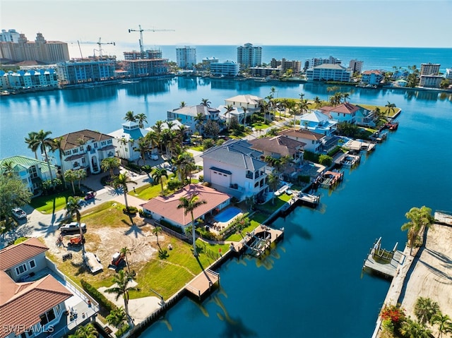 drone / aerial view with a water view