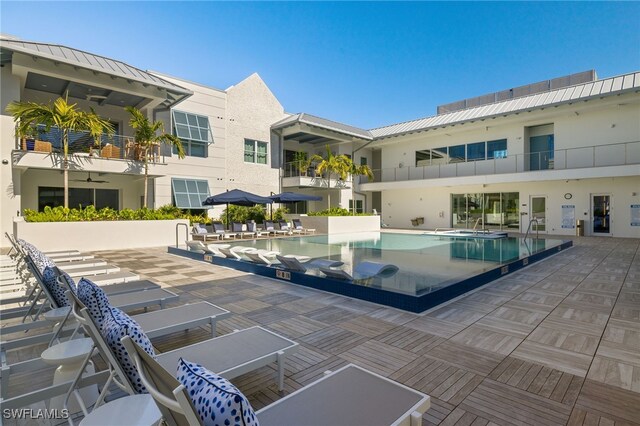 pool with a patio