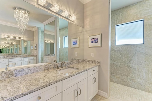 bathroom featuring vanity, tiled shower, a chandelier, and ornamental molding